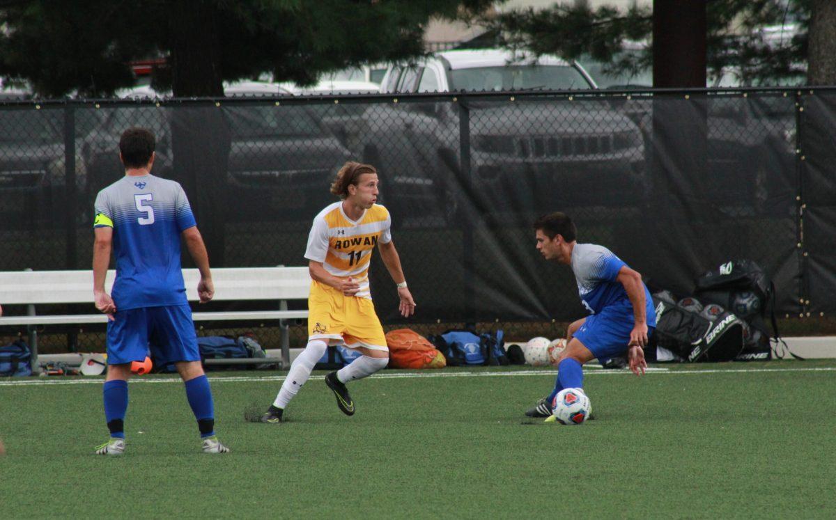 Junior forward Travis Wards looks up field against Washington and Lee. Ward scored in the 2-0 win. -Photo Editor/Amanda Palma