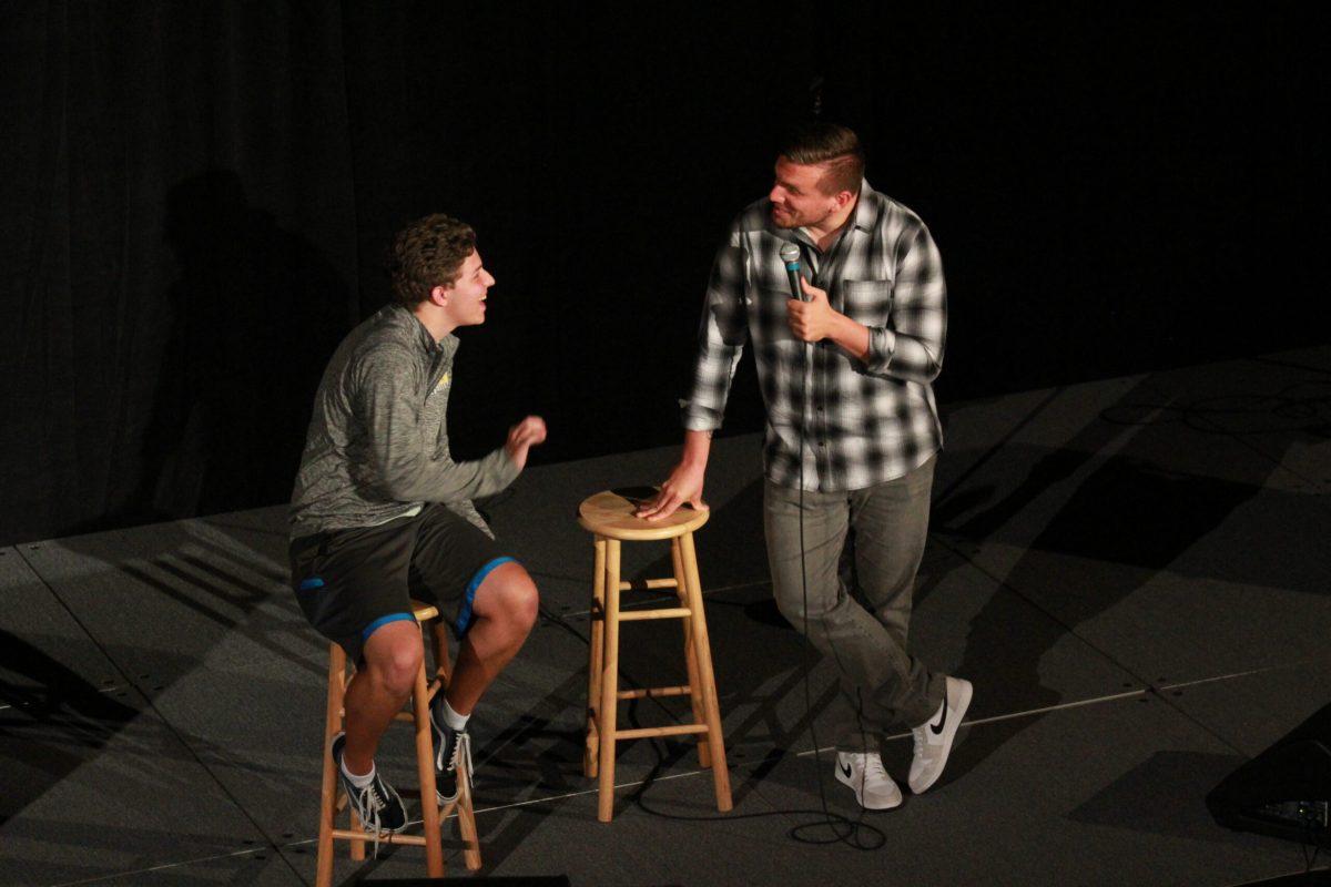 Comedian Chris Distefano interacting with audience member Trevor Shepard in the Student Center Pit. Distefano is known for his work on MTV's "Guy Code" and "Girl Code." Photo Editor/Amanda Palma