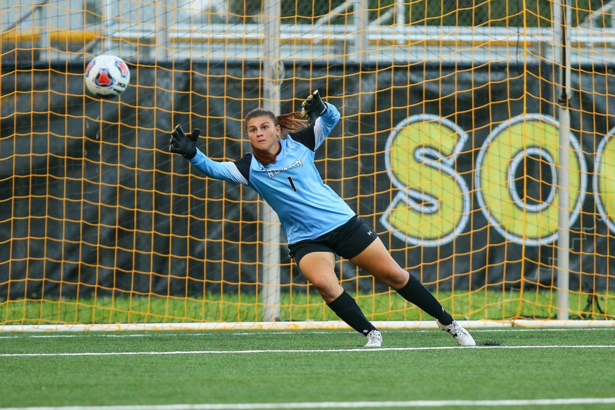 Sophomore goalkeeper Shelby Money prepares to dive to stop a shot. Money has 12 shutouts on the season. -Photo courtesy of Sports Information