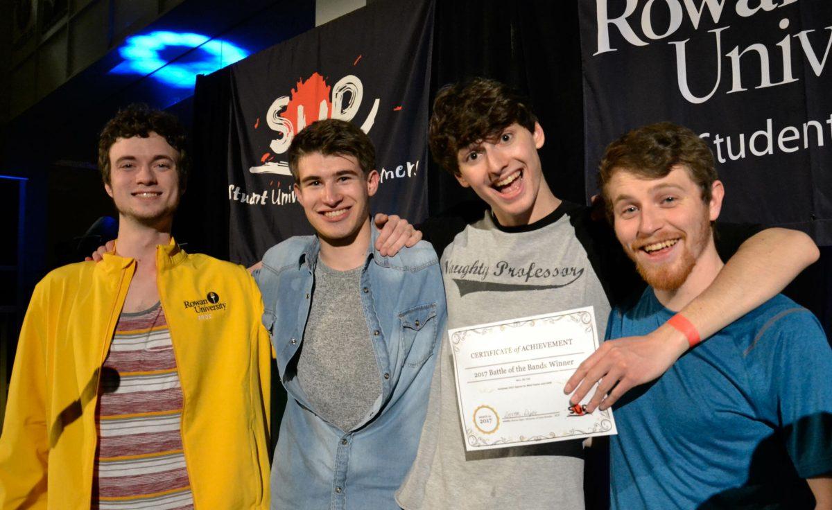 Battle of the Bands winner Burn Moore posing after their victory in the Student Center. They will be opening for Mike Posner at Hollybash at the end of April. Staff Photo/Nicole Mingo