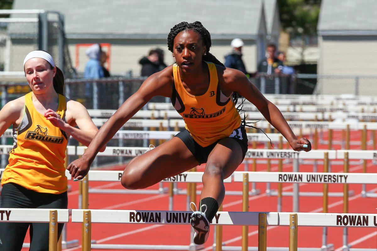 Aspen McMillan clears a hurdle at the Oscar Moore Invitational. McMillan got first in the 100 meter hurdles. -Photo courtesy of Sports Information