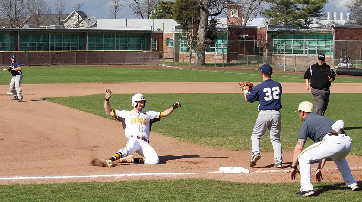 Dillon Mendel slides into third base against Penn State Abington earlier this year. Against Moravian on Wednesday, Mendel had one RBI. -Photo Editor/Amanda Palma