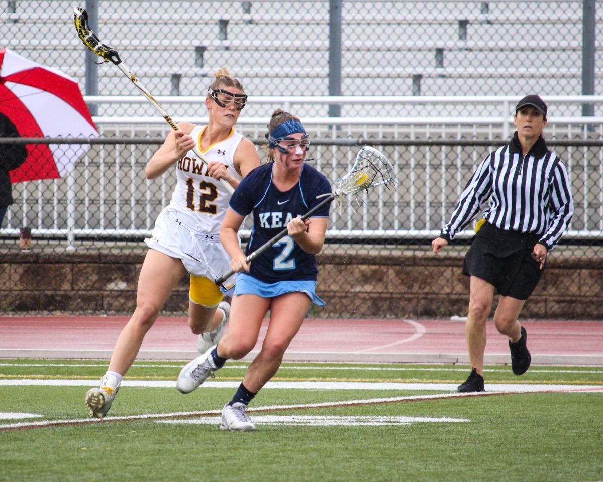 Senior attack Rachel Hofbauer tracks down a Kean player in a game earlier this year. Hofbauer has 15 goals on 32 shots this season. - Photo Editor/Amanda Palma