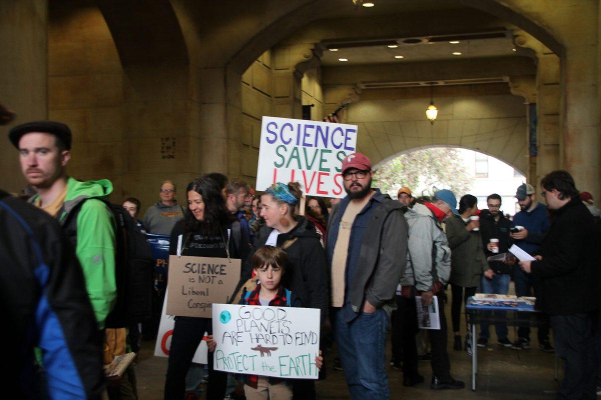 Protestors lined up under one of the arches at city hall ready to begin marching.The march in Philadelphia took place on April 22nd. -Staff Photo/Matt Kass