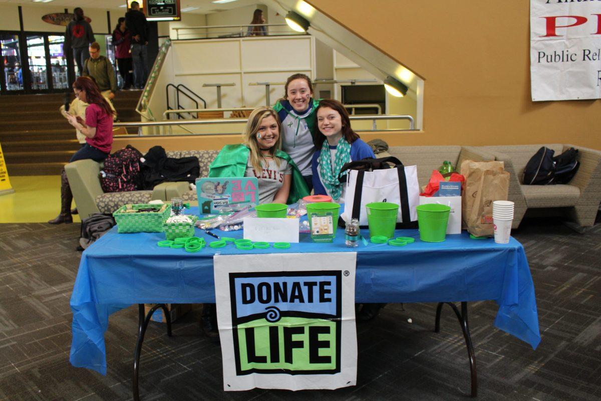 From left to right: volunteers Brenna Jones, Katarina DeFelice, and Collen Scott at Organ Donor Day. -Staff Photo/Lauren Kubiak