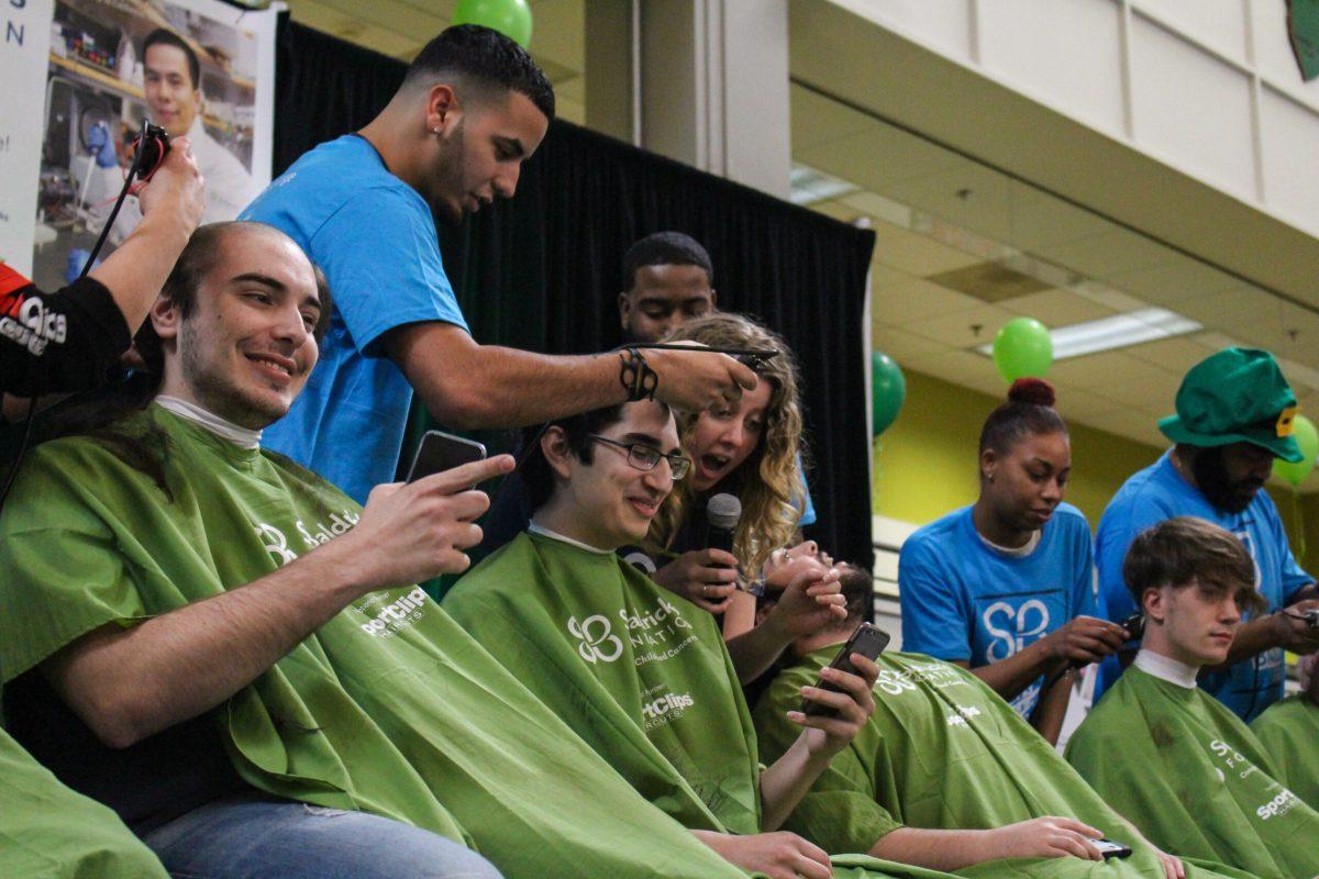 Students and community members shaved their heads in the Student Center to raise money for fighting cancer. -Photo Editor/Amanda Palma