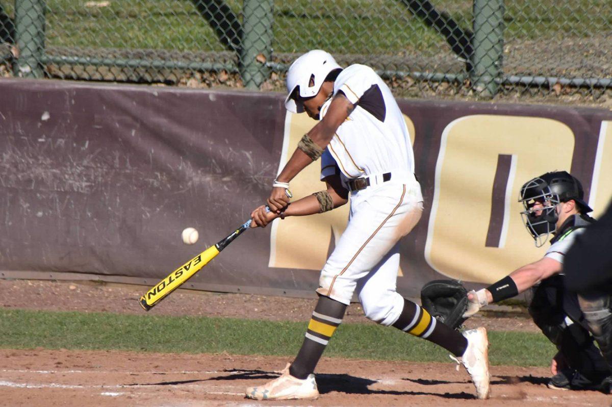 Junior outfielder Monny Strickland makes contact with a pitch earlier this season. Strickland has a .317 batting average and a team-high three triples on the year. -Photo courtesy of Monny Strickland