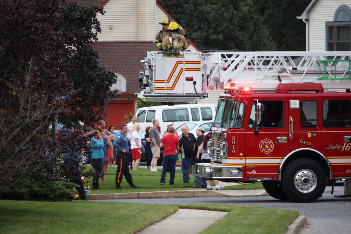 A lader truck from the Glassboro Fire Department sits at the scene of a house fire on Monday.-Staff Photo/Jaryd Leady