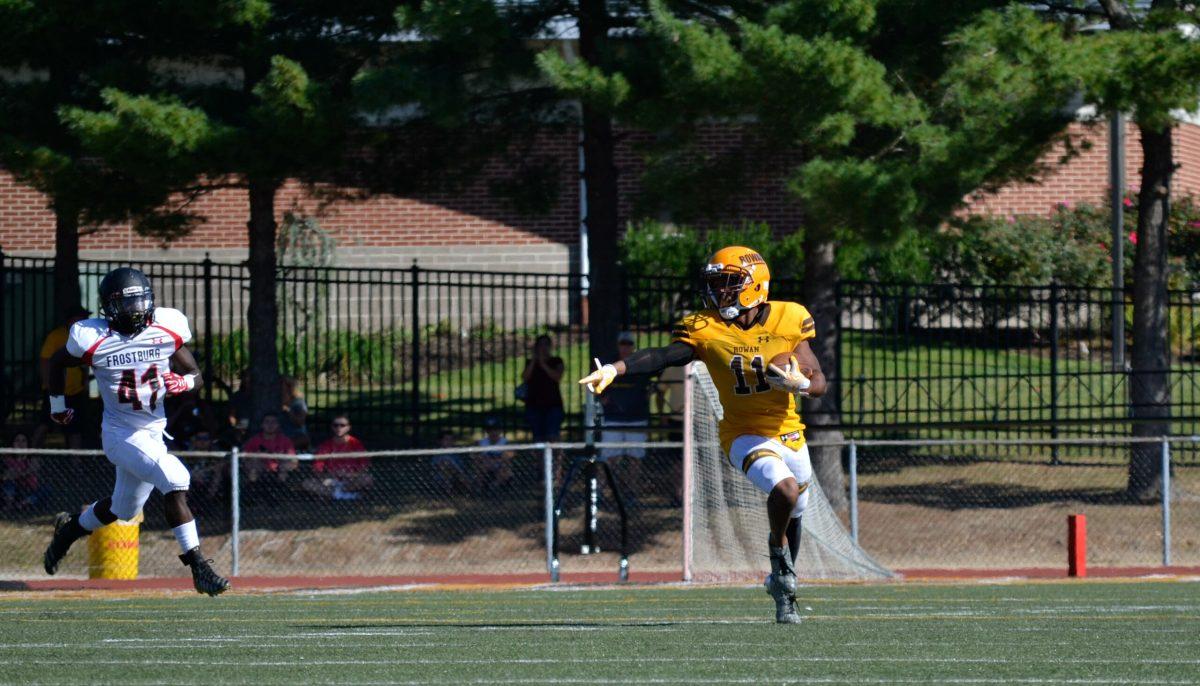 Senior wide receiver Jamel Smith avoiding a Frostburg State university defender on Saturday. Smith tallied 10 catches for 79 yards and a score. Photo Editor/Nicole Mingo