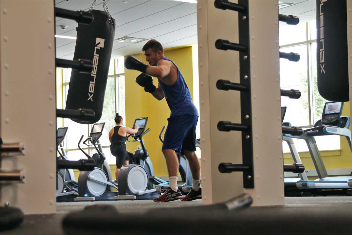 Bill VanDyker, hits the heavy bag on the Fitness Centers Queenax rack.
-Staff Photo/Justin Decker