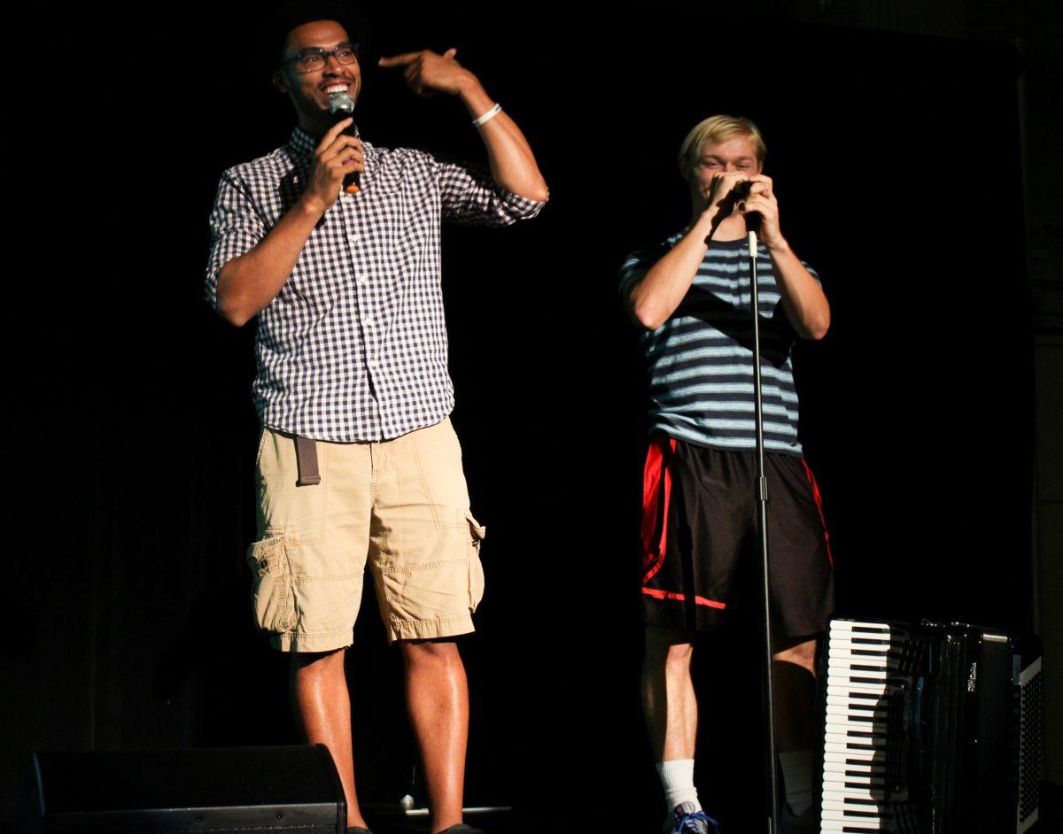 Rowan alum and host Charles Ozuna (left) with senior music major Steve Solkela (right). -Staff Photo/Maria Morales