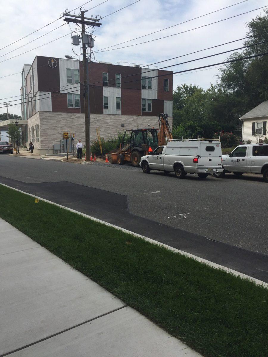 A backhoe crashed into the power conduit to the 301 W. High Street building Tuesday, Sept. 13. (Staff Photo/Jesse Mounce)