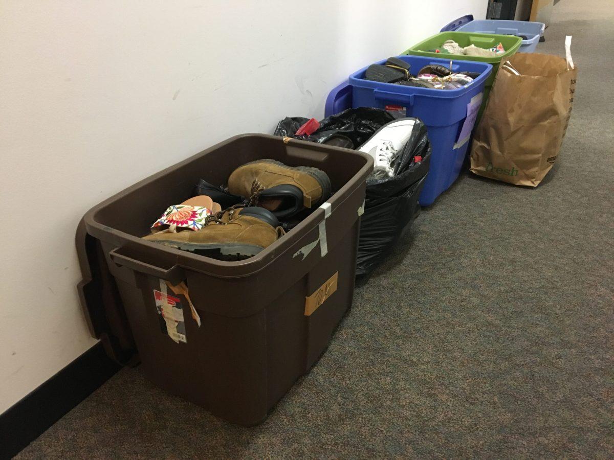 Shoes donated to Soles4Souls sit waiting to be collected. -Staff Photo/Andrew Turco