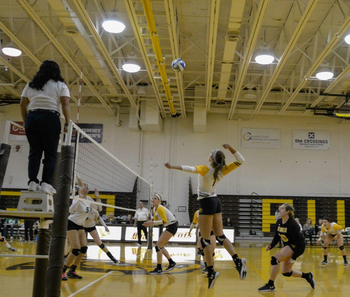 Freshman outside hitter Taylor Modica goes up for a kill against Stevenson University this past weekend at the Rowan Quad. Photo Editor/Nicole Mingo