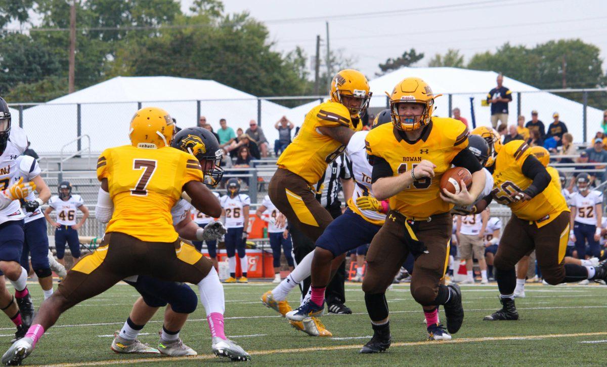 Sophomore quarterback Quinn Collins in this past Saturday's game against The College of New Jersey. Collins went 21 of 29 for 148 yards in the 20-14 loss. Photo Editor/Amanda Palma