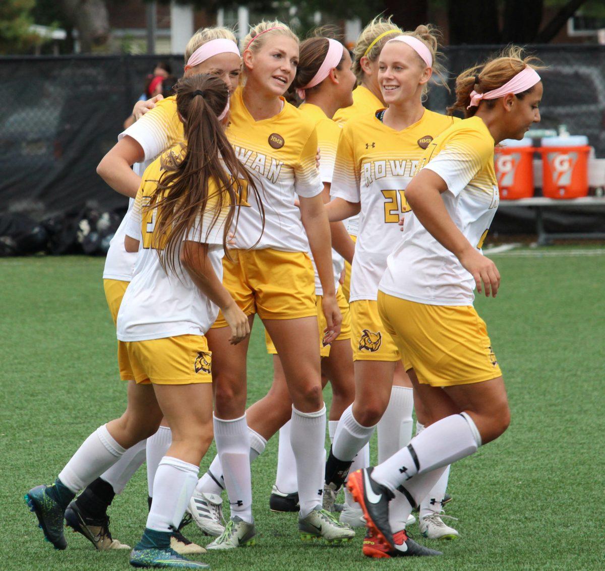 The Rowan women's soccer team celebrates during a 5-0 shutout victory against Kean University on Saturday. Photo Editor/Amanda Palma