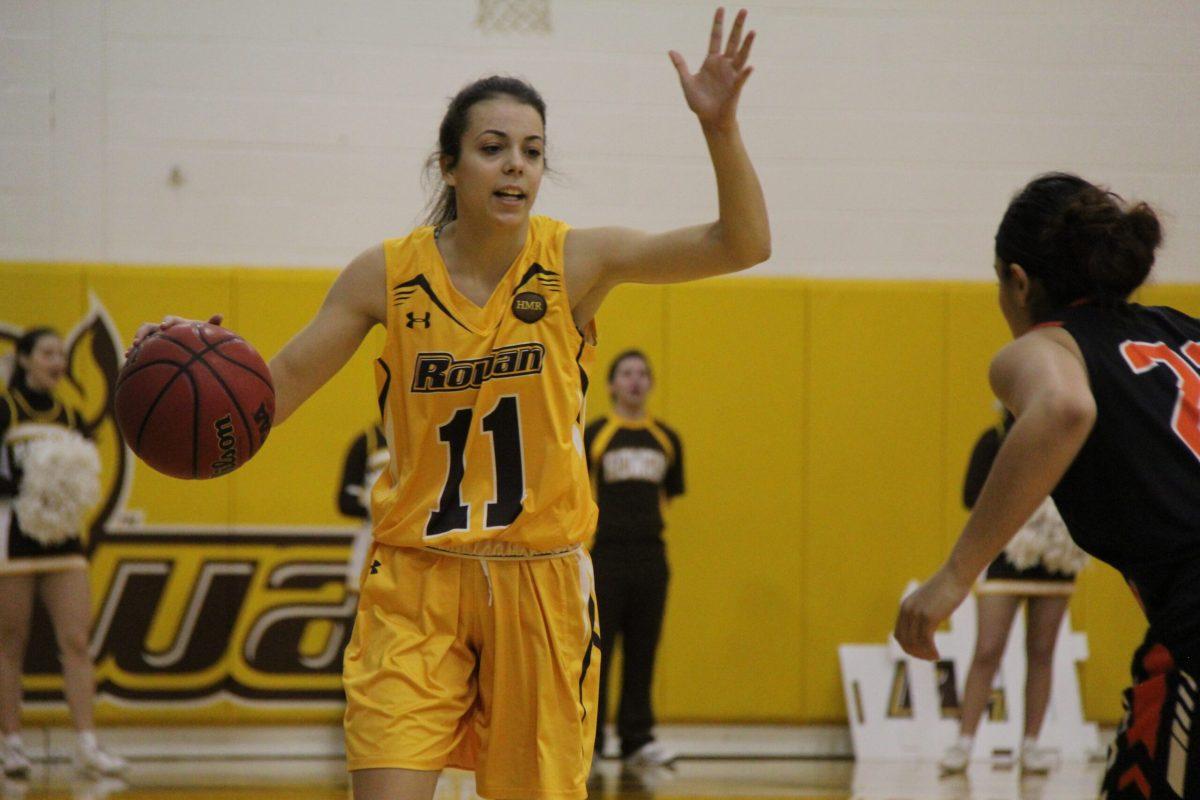 Sophomore guard Alexis Kriley bringing the ball up in a game last season. Kriley averaged 7.4 points per game last year. Photo Courtesy of Spiro Costidis, Sports Information.