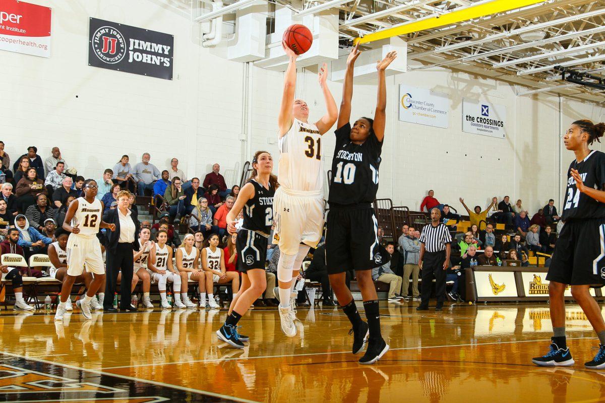 Senior center April Szymczyk goes up for a shot against Stockton University earlier this year. Photo courtesy of sports information