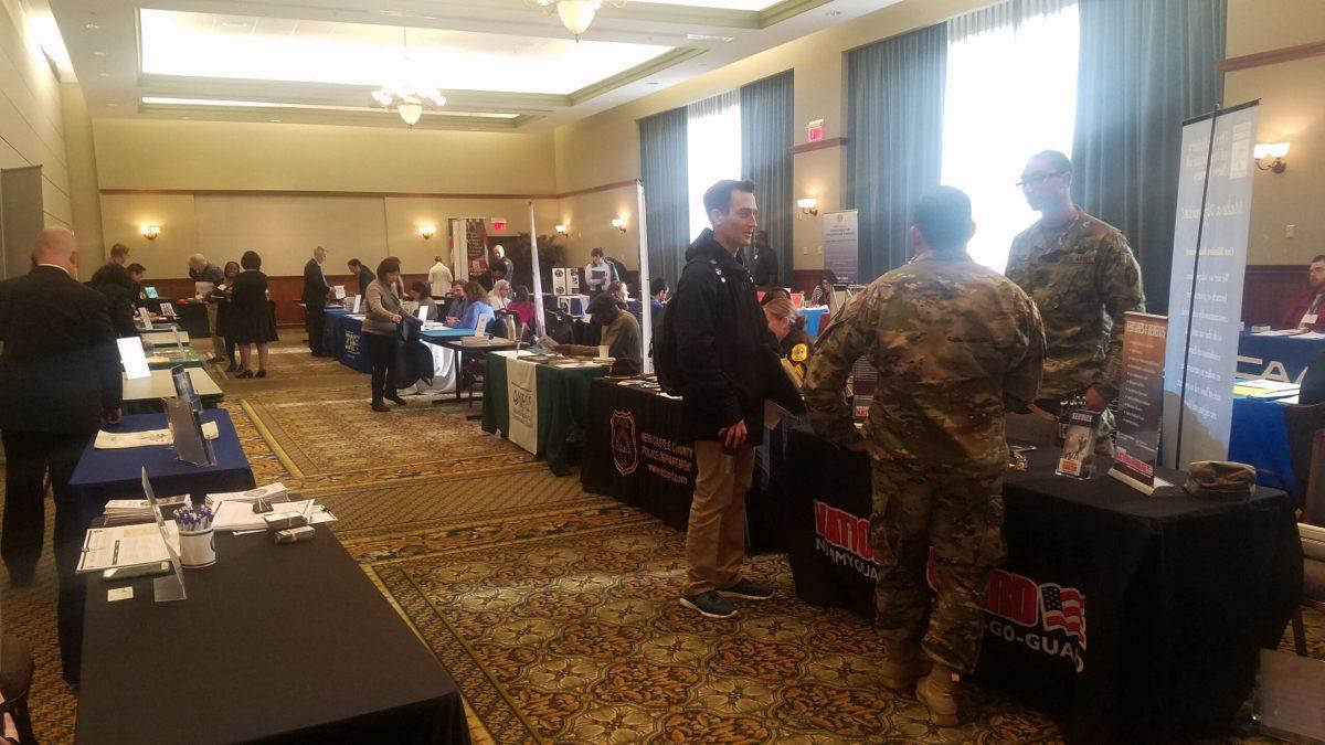 Atendees and employers mingle at the Federal and Non-Profit Career Fair. -Photo Editor/Amanda Palma