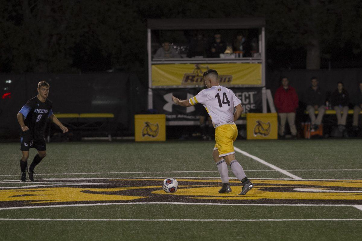 Jake Connors on the attack Wednesday night against Stockton University. Connors provided the game-winning goal in double overtime to send the Profs to the final. -Assistant Photo Editor/Miguel Martinez