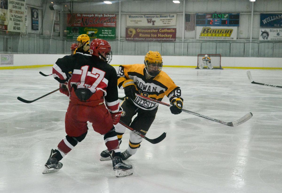 Forward Anthony Dellerose looks to get passed a defender earlier this year against Saint Josephs University. Photo Editor/Nicole Mingo