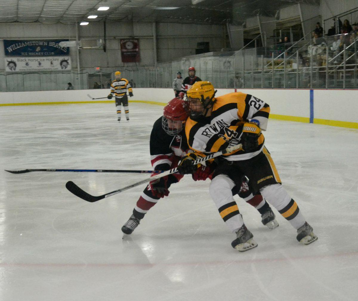 Rowan forward Samuel Meyer takes on a Montclair State University defender earlier this season. Photo Editor/Nicole Mingo