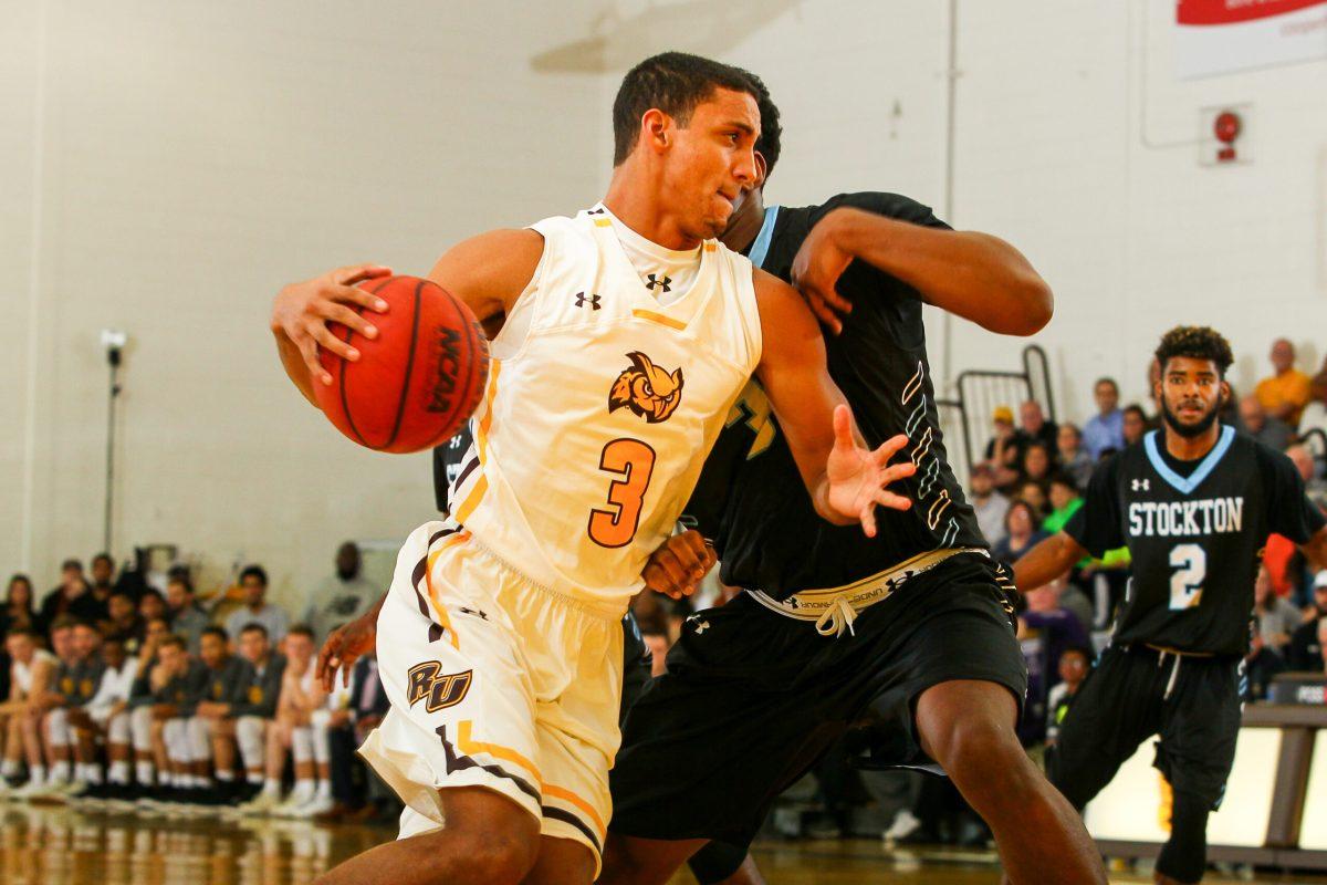 Rowan senior and captain TJ Booth drives to the rim earlier this year against Stockton University. Photo courtesy of Sports Information 