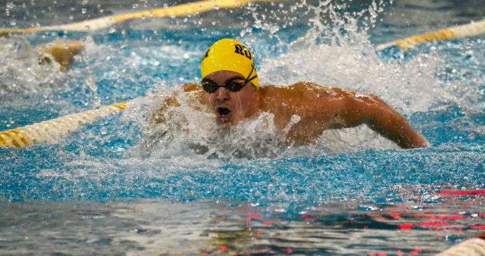 Senior John Tepper in pool against University of Bridgeport last year. Photo Editor/Nicole Mingo