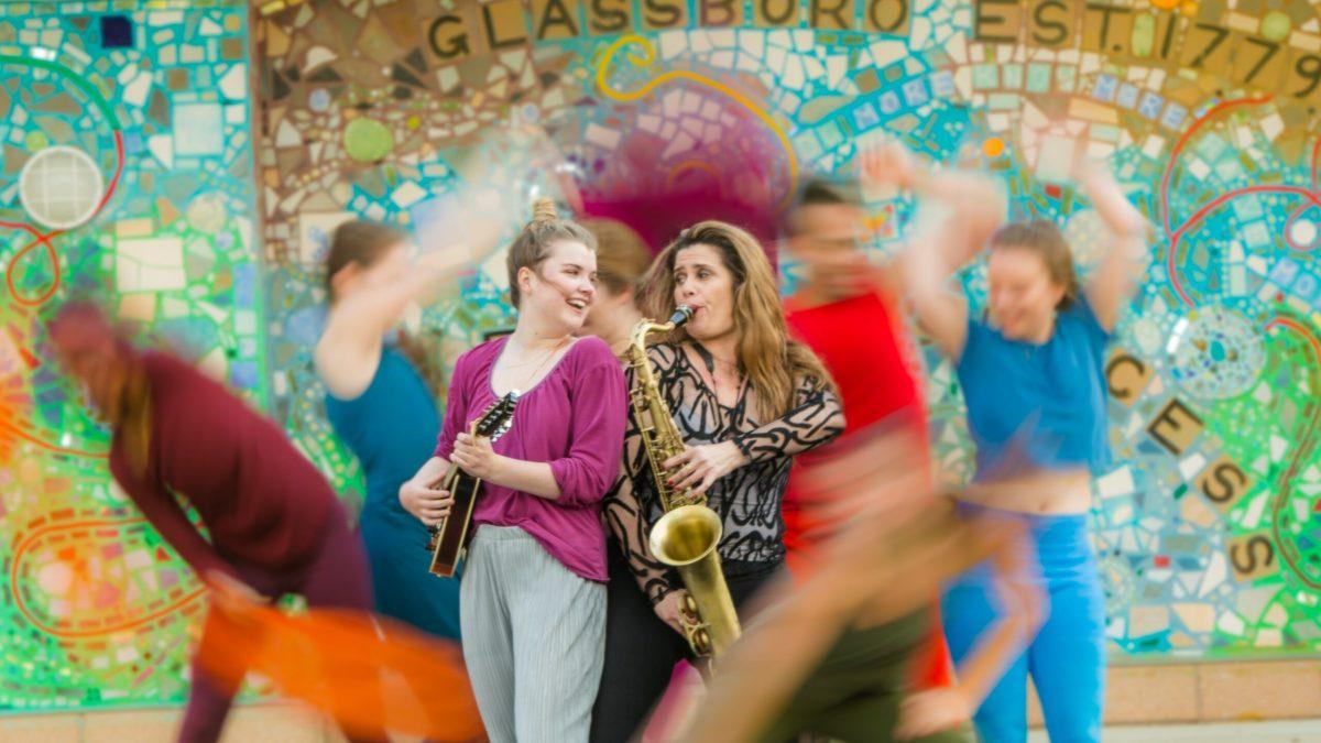 Student cast member and music director Kylie Westerback (left) and guest artist Christiane Matallo right with other 