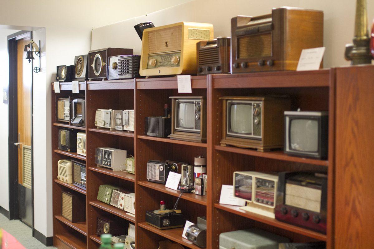 Peices of the collection at the RCA Heritage Museum line a shelf in the museum. -Assistant Photo Editor/Miguel Martinez