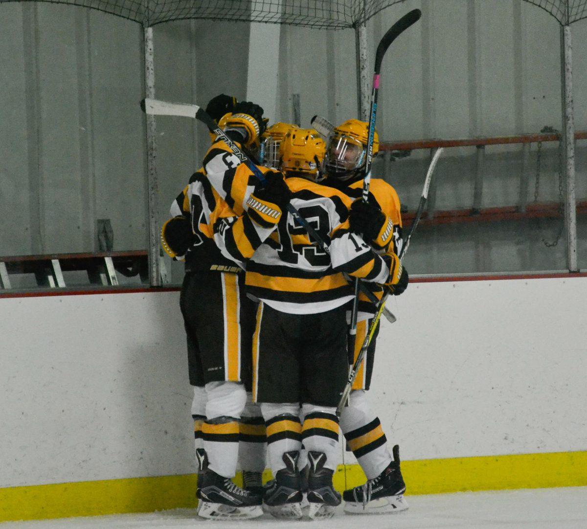 Rowan forward Trevor Rucci  celebrates with teammates in a game against Montclair State University earlier this year. Photo Editor/Nicole Mingo