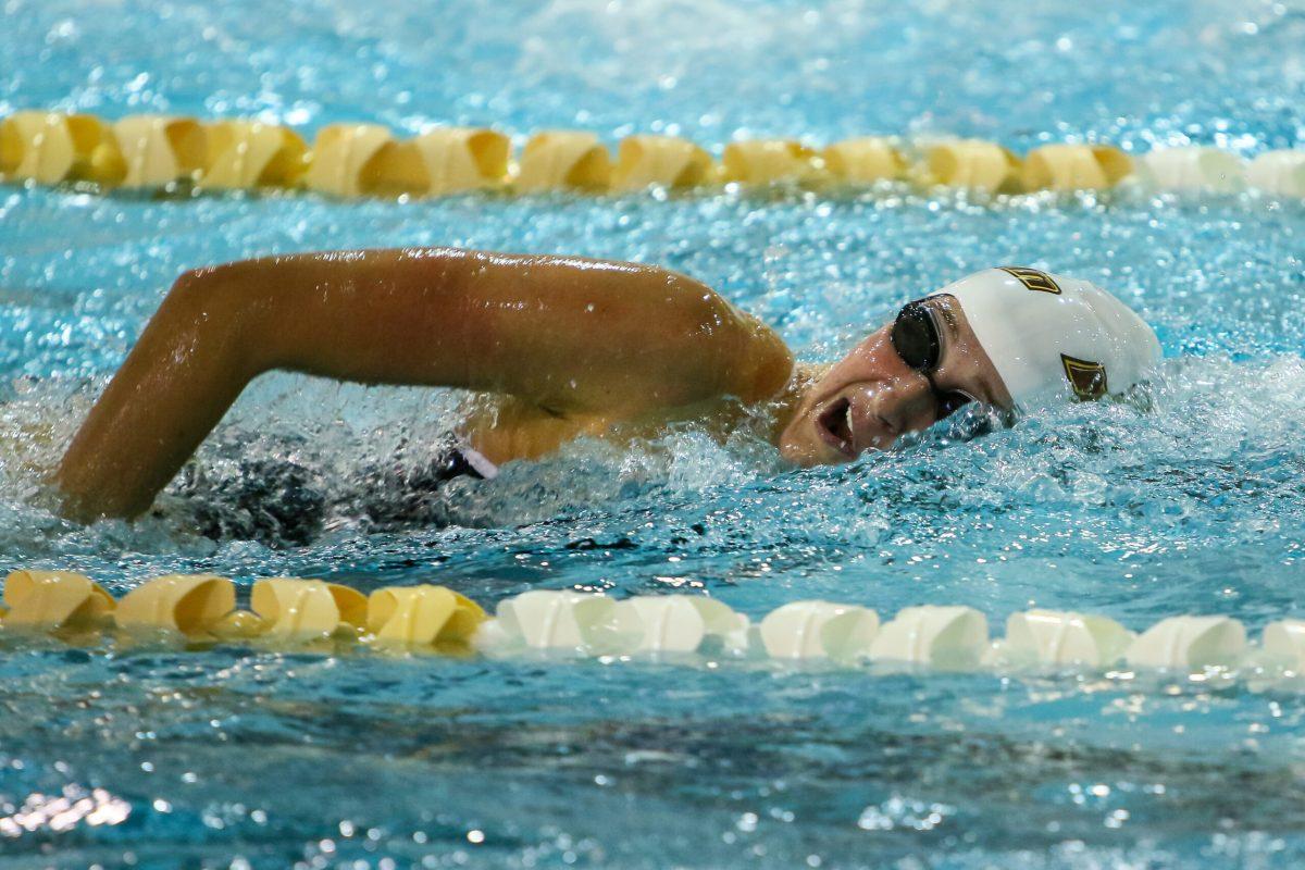 Junior captain Miranda Coughlan swims during an event earlier this year. Coughlan came in third in the 100 freestyle at the WPI Gompei Invitational this past weekend. Photo courtesy of Sports Information