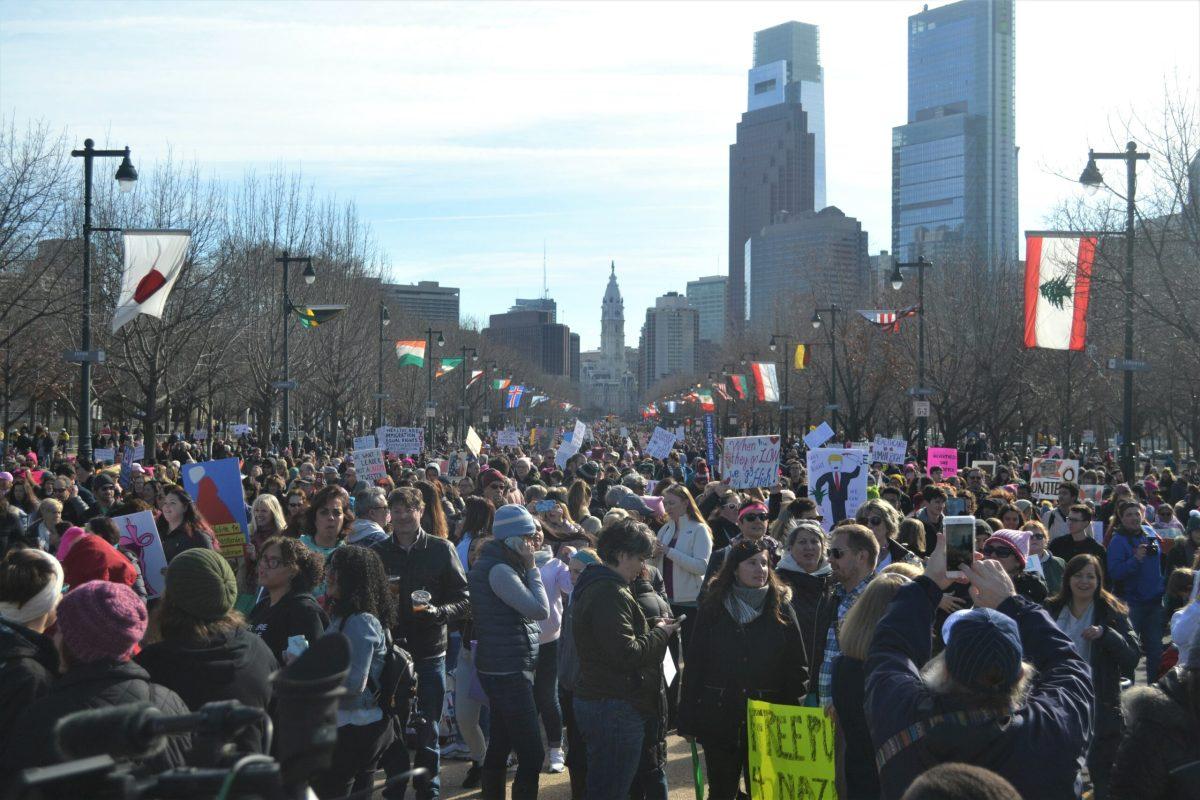 Crowds march down the Benjamin Franklin Parkway at the Philadelphia Women's March on January 20, 2018. -News Editor/Matt Kass