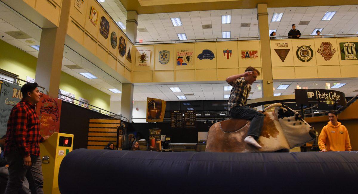 A mechanical bull tests prof fortitude at RAH's Greatest Hits on Friday, Jan. 26, 2018 at the Chamberlain Student Center. -Photo Editor/Nicole Mingo