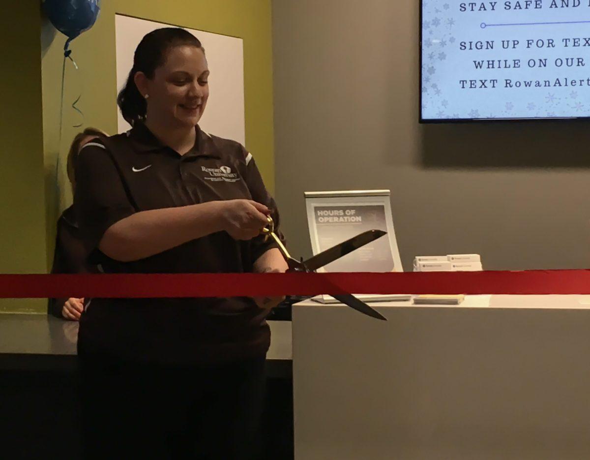 Ambre McKenna, the program assistant for the SCCA info desk cuts the ribbon, dedicating the new facility on SCCA Day, Jan. 16, 2018. -News Editor Matt Kass