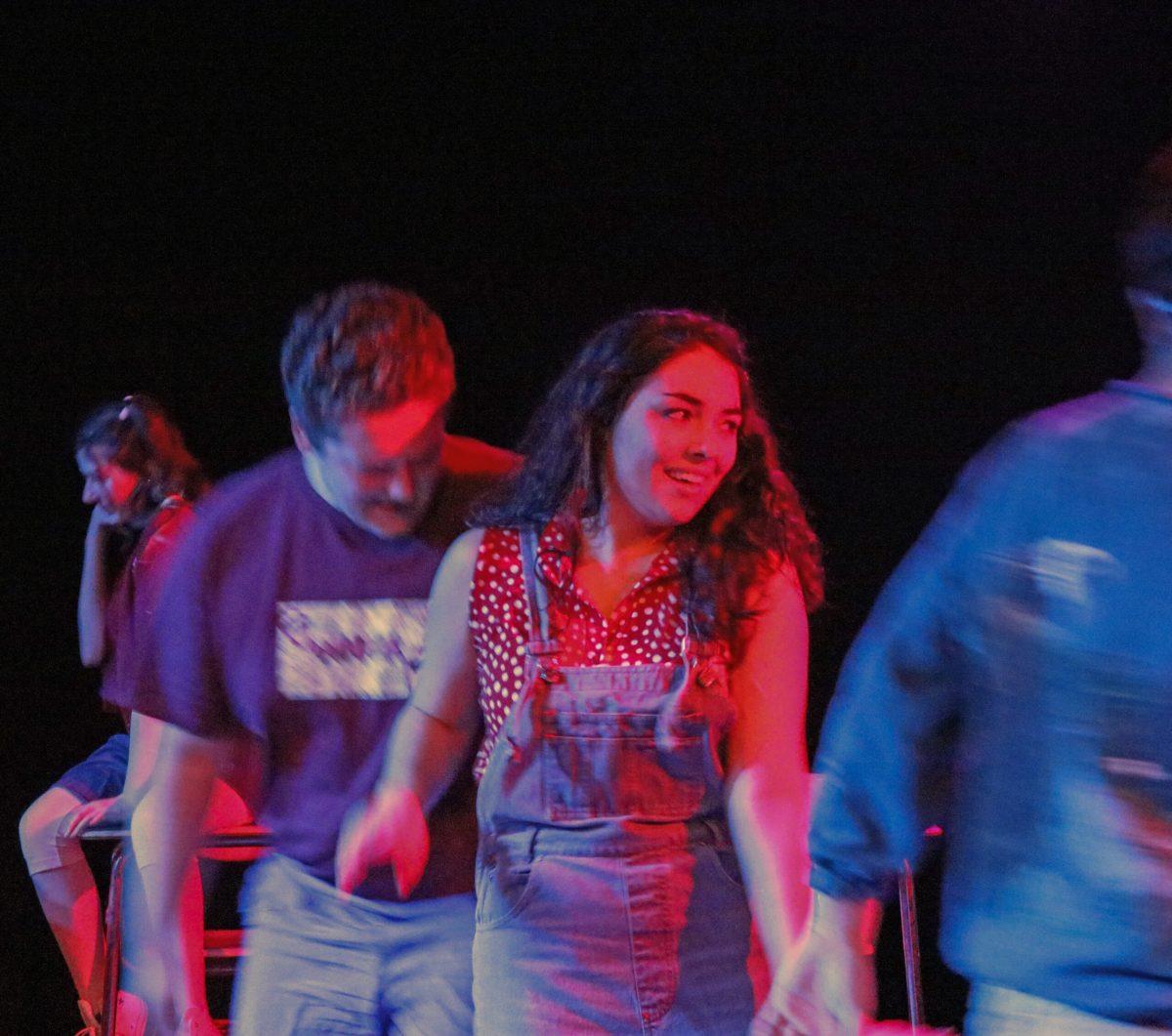 Sophomore writing arts major Dina Folgia with the rest of "The Boys" perform a choreographed number to "Gaims" by KAMAU on Friday, Feb. 9, 2018 in Bunce Hall. -Staff Photo/Scott Buzby