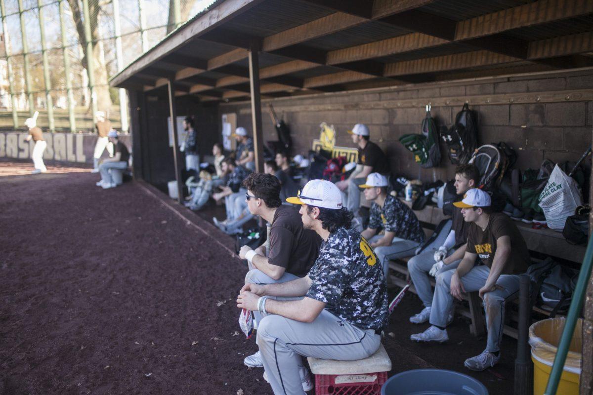 Members of the Rowan baseball team look onto the diamond during a practice this spring preseason. Assistant Photo Editor/Miguel Martinez