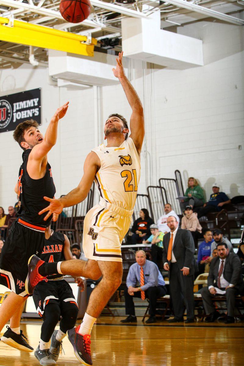 Rowan junior guard and co-captain Nick DePersia goes for a layup against William Paterson University earlier this year. Photo courtesy of Sports Information