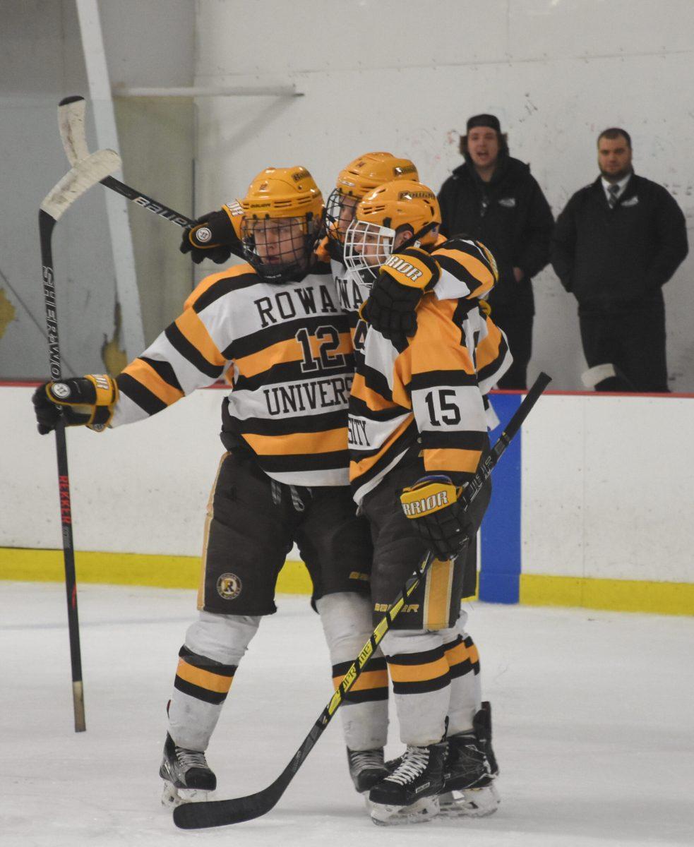 Members of the Rowan DII ice hockey team celebrate in a game earlier this season against Stevenson University. Photo Editor/Nicole Mingo