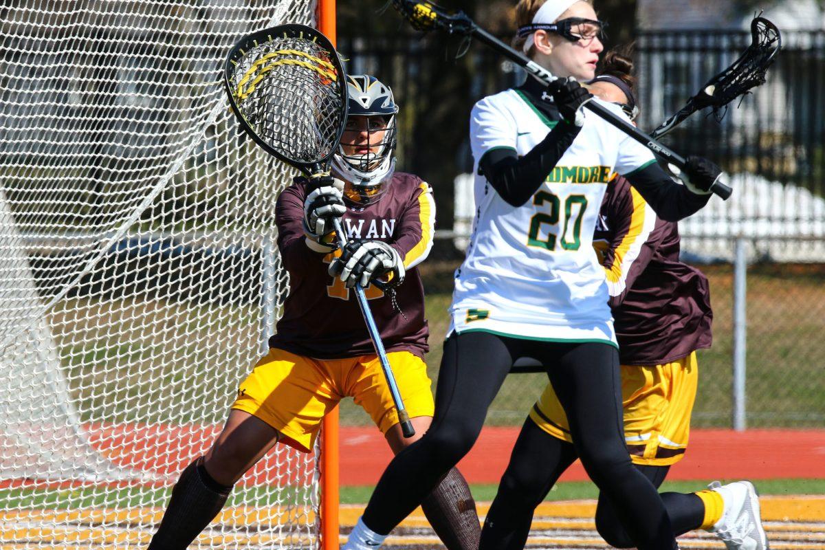 Rowan senior goalie Erin Horner stands strong in the net against Skidmore College earlier this season. The Profs won 17-10. Photo courtesy of Sports Information