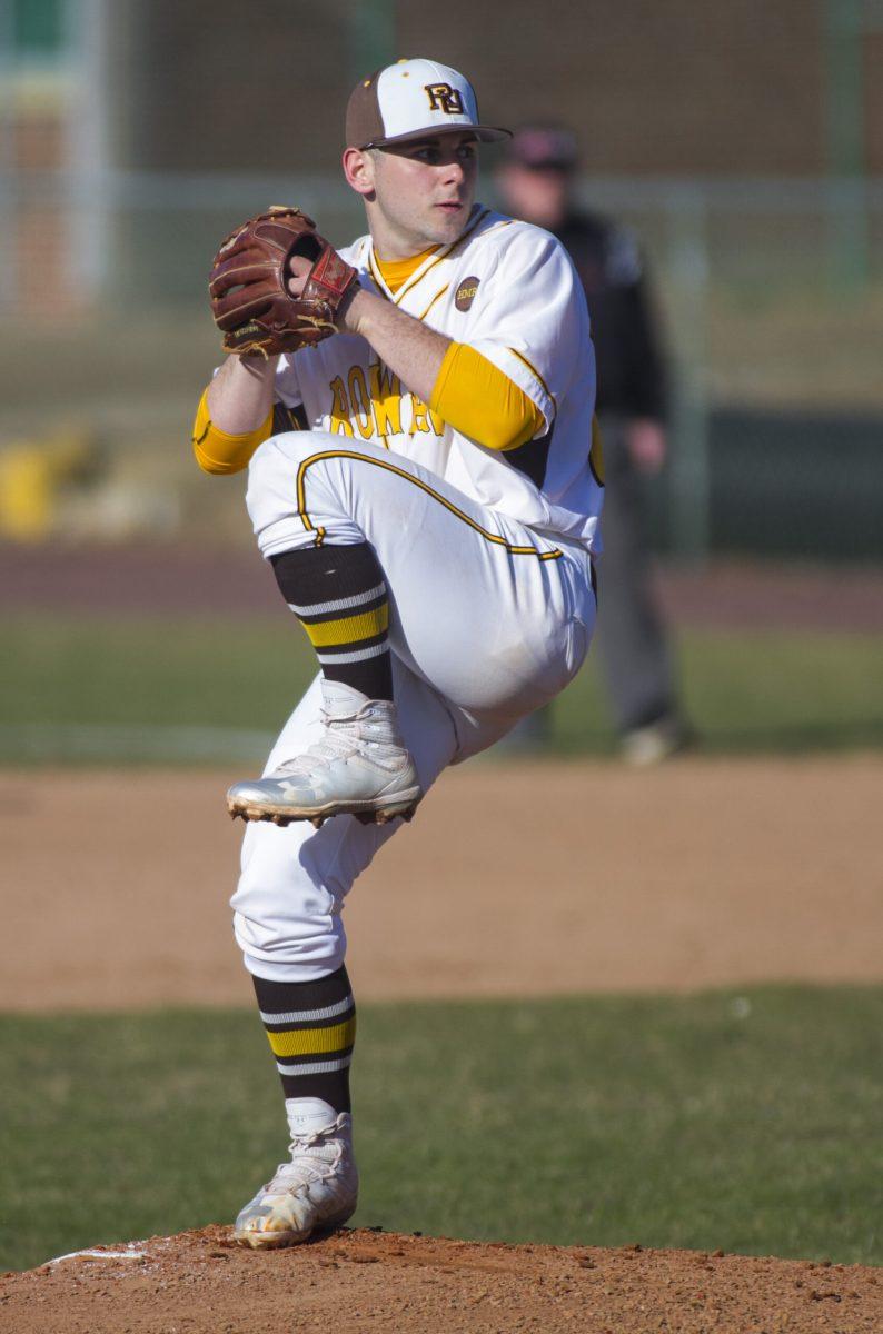 Rowan pitcher Andrew Cartier winds up for a pitch against Arcadia on Tuesday. He pitched four innings, giving up just as many runs and hits. Assistant Photo Editor/Miguel Martinez