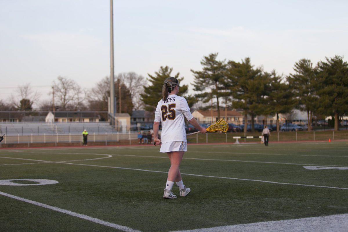 Senior attack Kim Doyle looks onto the field Saturday night during Rowan's 21-3 victory against Rampao College. Assistant Photo Editor/Miguel Martinez