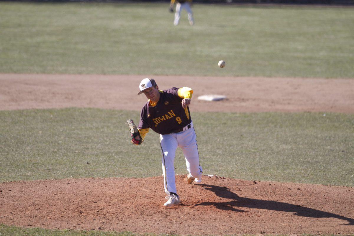 Sophomore pitcher Drew Ryback delivers a pitch against Neumann University earlier this season. Ryback is 6-0 with a 3.34 ERA. Assistant Photo Editor/Miguel Martinez