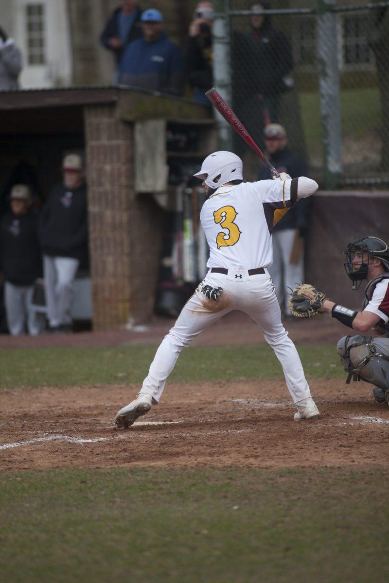 Junior infielder and captain Dillon Mendel takes an at-bat earlier this year. Assistant Photo Editor/Miguel Martinez