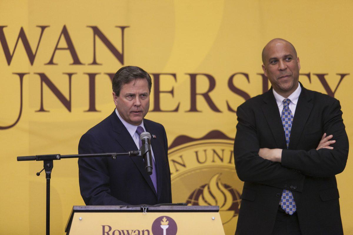 Congressman Donald Norcross And Senator Cory Booker stand together on stage during their co-hosted press conference on March 29, 2018 in the Rowan University Camden Academic Building.  (Assistant Photo Editor/ Miguel Martinez)