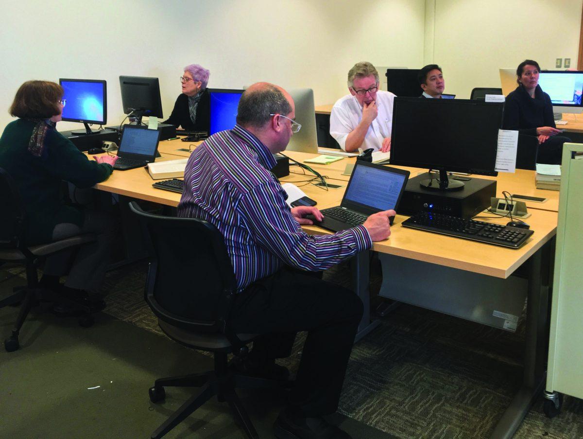 Coders sit and work at the Wikipedia Edit-a-thon on April 6, 2018. -News Editor/Matt Kass