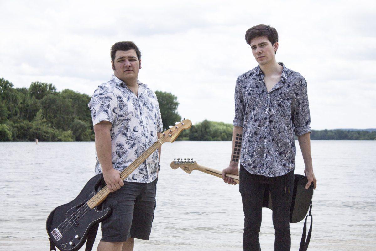 Rowan biomedical engineering senior Andy Kapetanakis (left) and Avery Stoker perform bass and guitar and their new self-titled release. - Photo courtesy of Olivia Brand