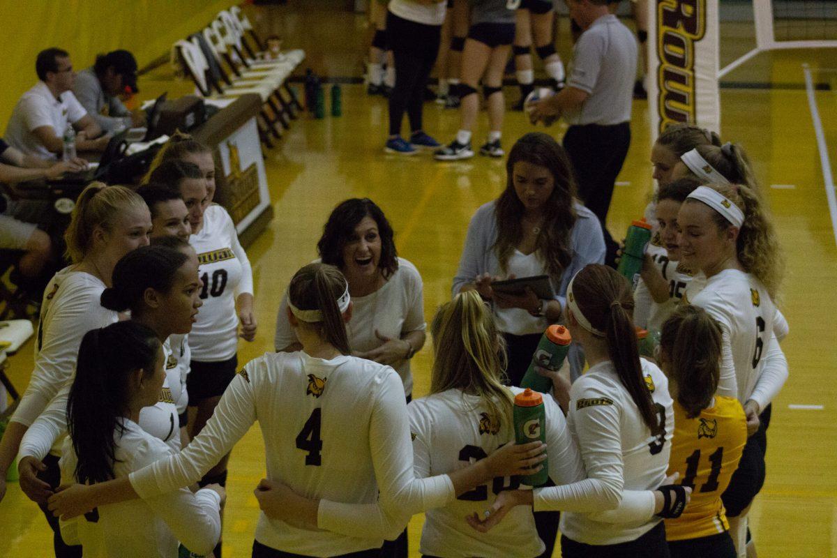 Head coach Deana Jespersen shares a moment with her team before a game at the Profs Invitational this year. The team is 10-4 on the season. Staff Photographer/Ray Baldassari