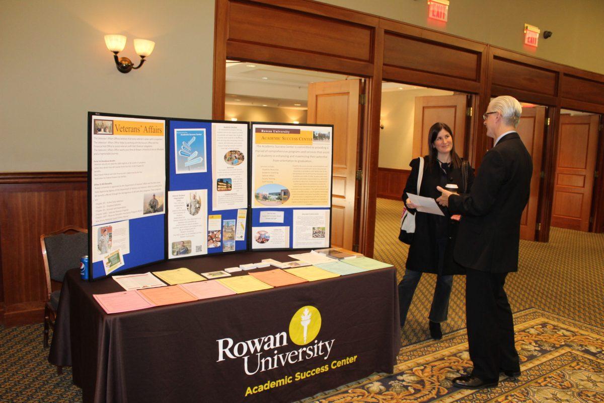 Lara Stolman, director of documentary "Swim Team," speaks with John Woodruff, Director of the Rowan Academic Success Center, at the screening. - Tara Lonsdorf/Arts & Entertainment Editor.