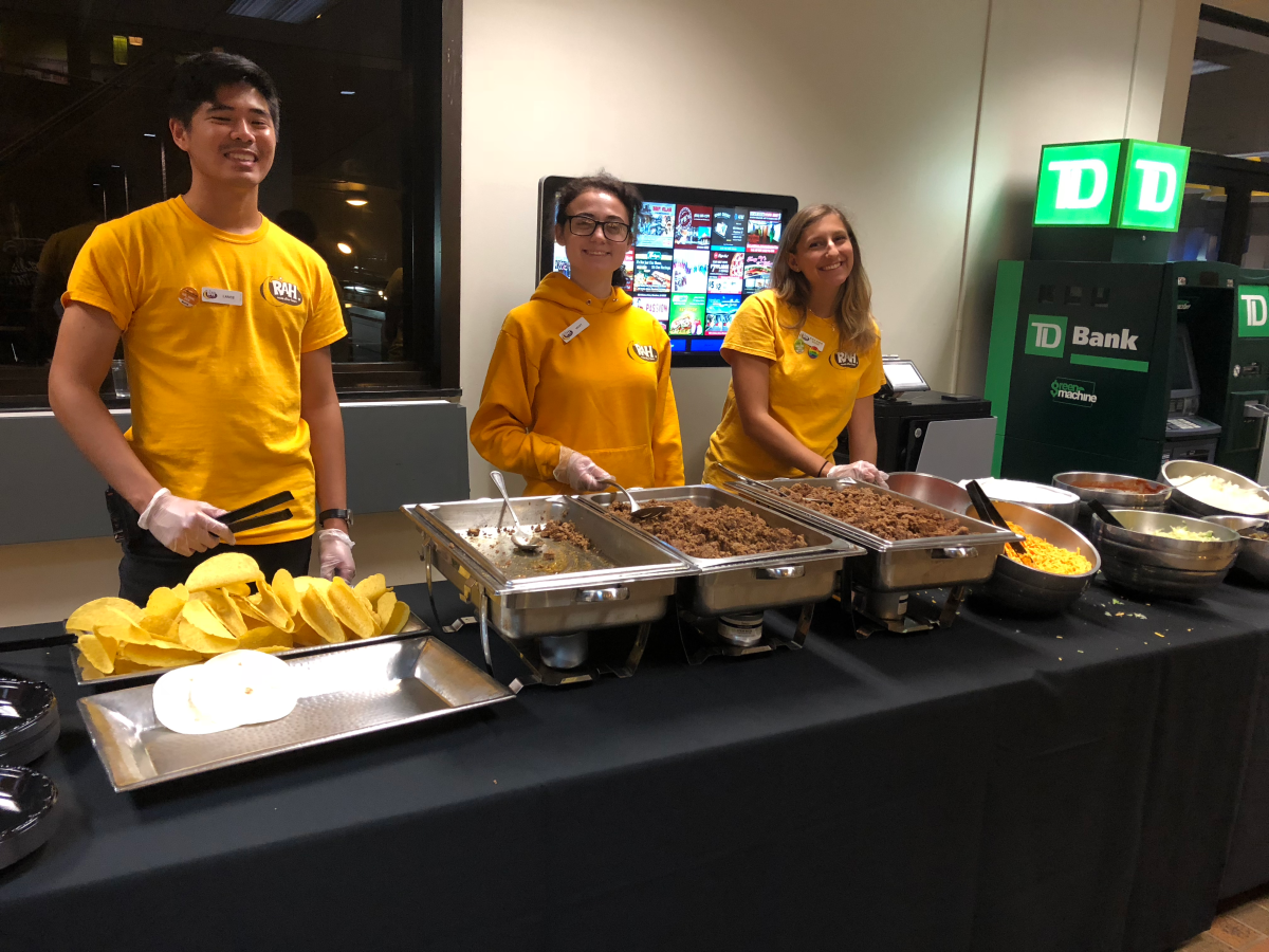 Lance Guzman, Vicky Rubinson and Maddie Schille worked the taco bar at RAHBrainery in 2019. - Staff Writer/ Kalie VanDewater